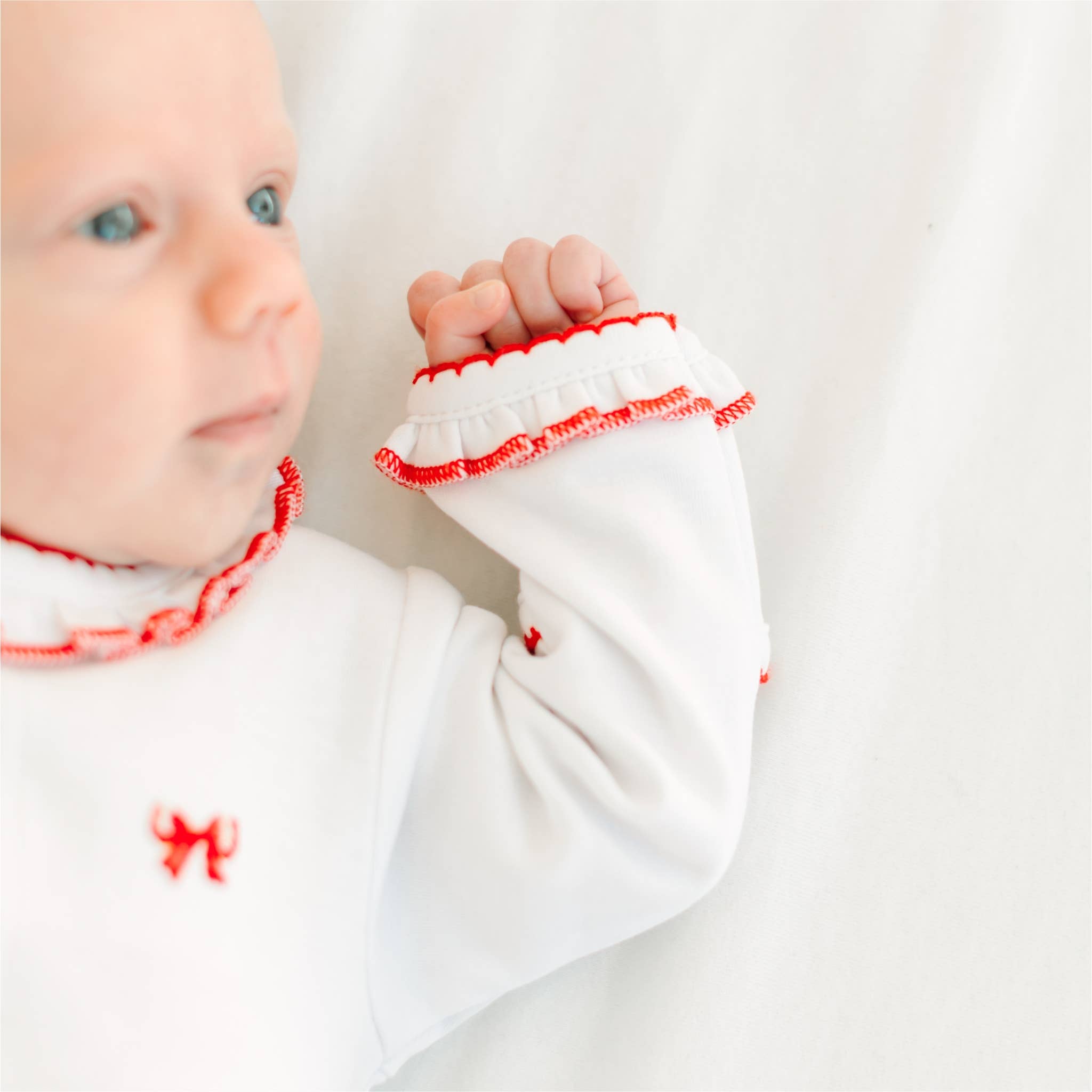 Scarlett Bows Scattered Ruffle Footie: Newborn Magnolia BabyTAYLOR + MAX